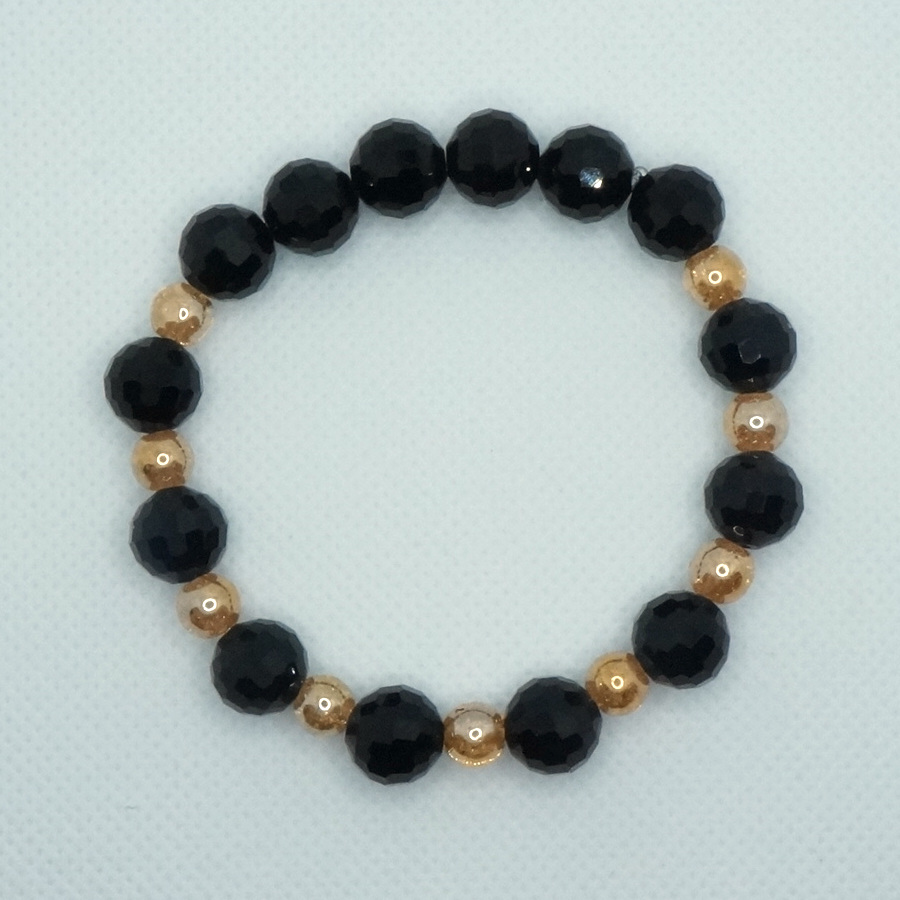 Bransoletka z kryształu czarnego i kryształu w kolorze złota. - obrazek 2